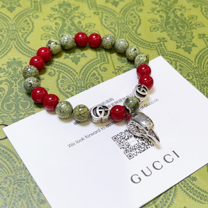 G*u*i bracelets